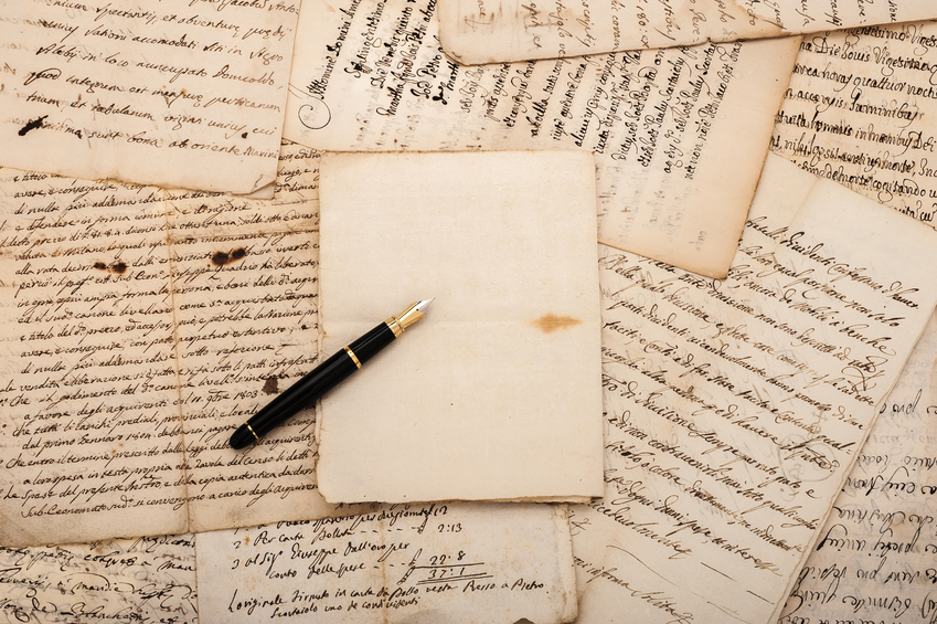 Fountain pen on antique letters and empty sheet